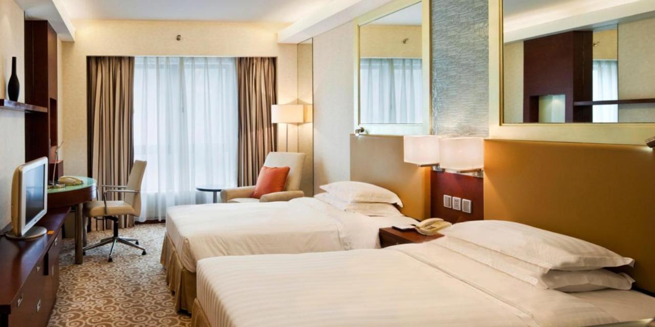 Guo Ji Yi Yuan Hotel Peking Zimmer foto
